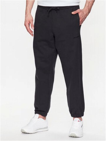 New Balance Teplákové kalhoty MP23551 Černá Relaxed Fit