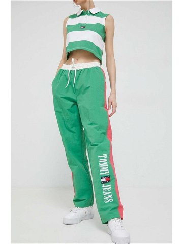 Tepláky Tommy Jeans zelená barva vzorované