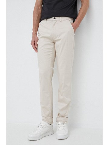 Kalhoty Calvin Klein pánské béžová barva přiléhavé K10K110963
