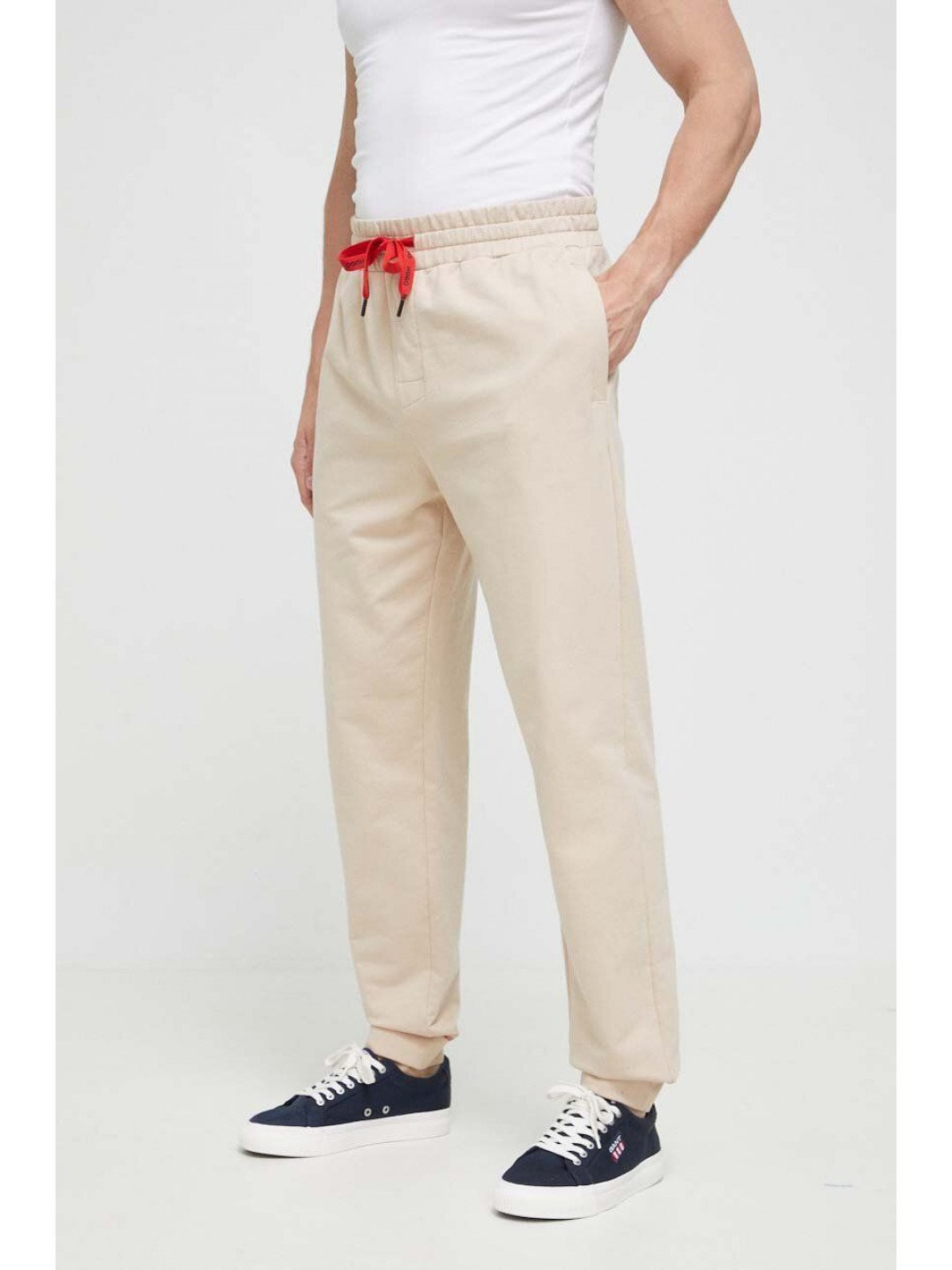 Bavlněné kalhoty HUGO béžová barva