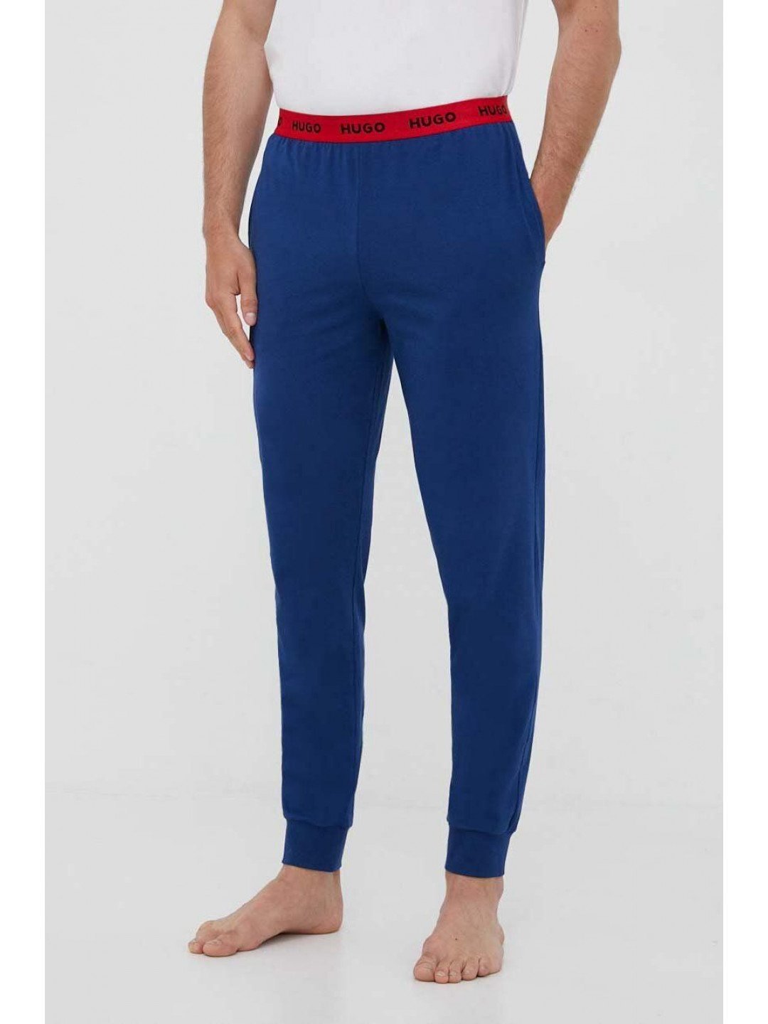 Pyžamové kalhoty HUGO pánské tmavomodrá barva 50493128