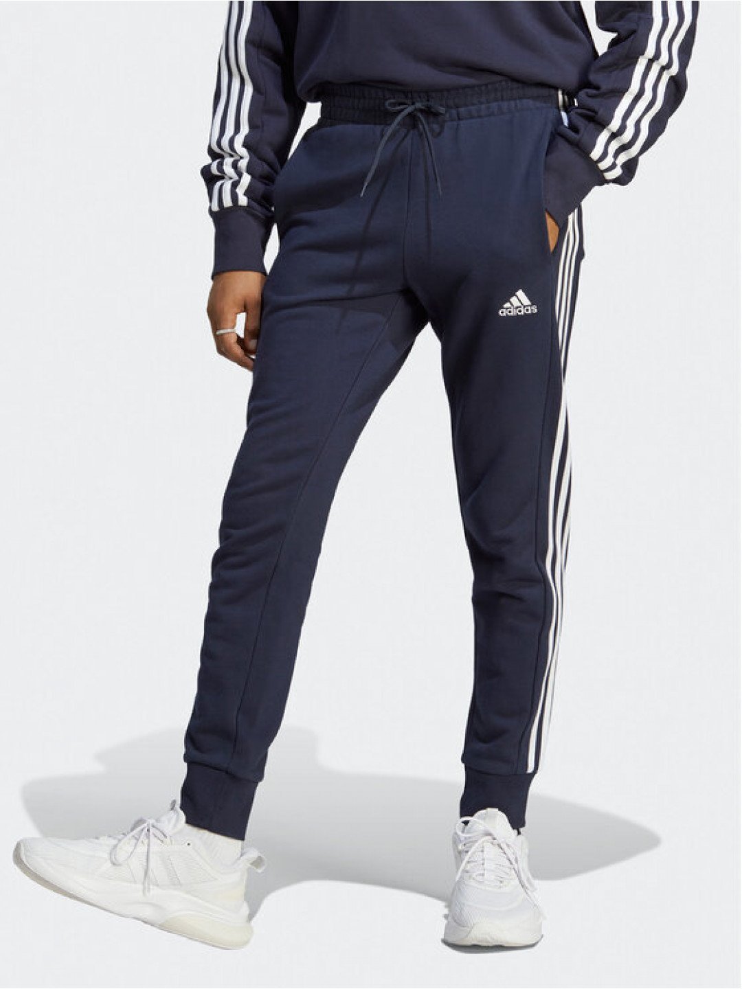Adidas Teplákové kalhoty Essentials French Terry Tapered Cuff 3-Stripes Joggers IC9406 Modrá Regular Fit