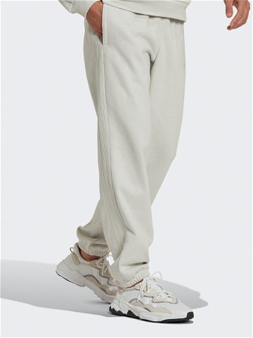 Adidas Teplákové kalhoty Reveal Essentials HK2728 Béžová Regular Fit