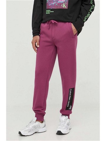 Tepláky Calvin Klein Jeans fialová barva