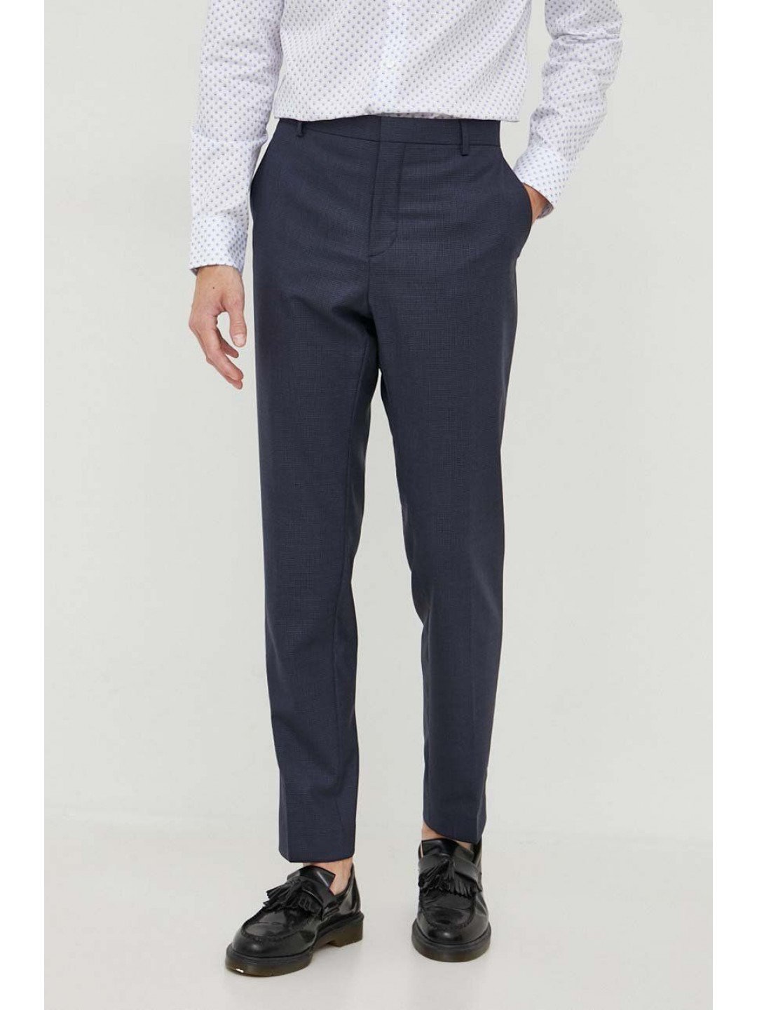 Vlněné kalhoty Calvin Klein tmavomodrá barva jednoduché