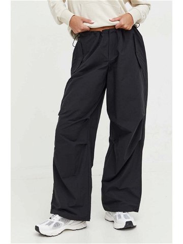 Kalhoty Tommy Jeans dámské černá barva široké medium waist DW0DW16387