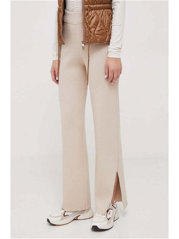Kalhoty s příměsí vlny Calvin Klein béžová barva široké high waist