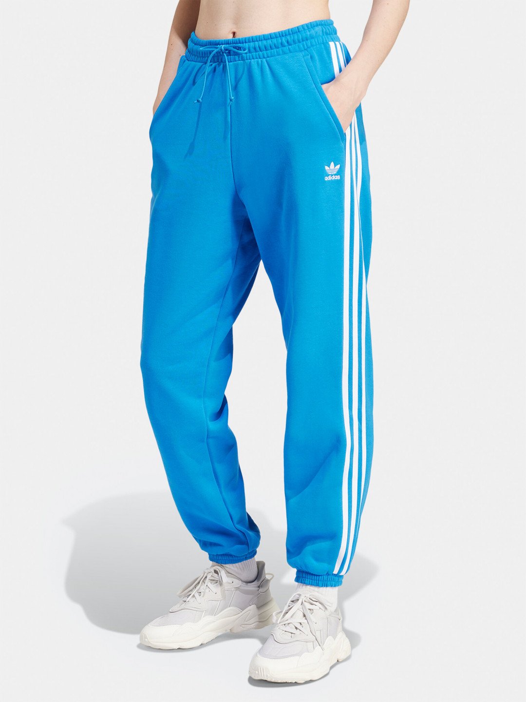 Adidas Teplákové kalhoty adicolor Classics 3-Stripes IR8092 Modrá Regular Fit