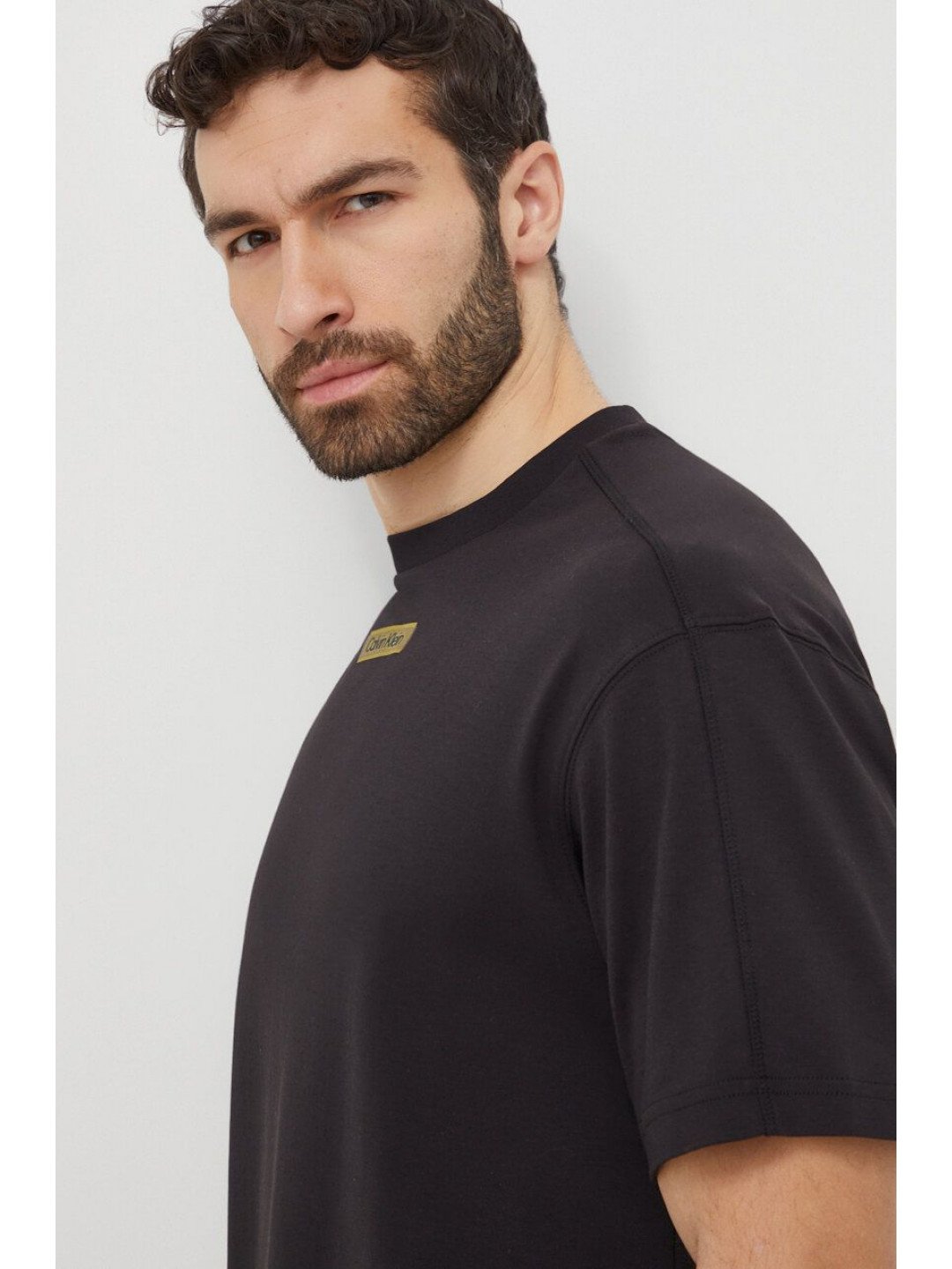 Bavlněné tričko Calvin Klein černá barva s potiskem K10K112400