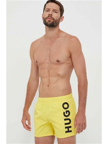 Plavkové šortky HUGO žlutá barva 50469311