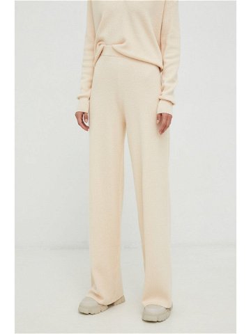 Kalhoty s příměsí vlny Calvin Klein dámské béžová barva jednoduché high waist