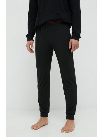 Pyžamové kalhoty HUGO pánské černá barva