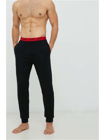 Pyžamové kalhoty HUGO pánské černá barva 50480236