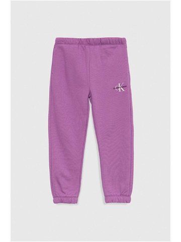 Dětské tepláky Calvin Klein Jeans fialová barva hladké