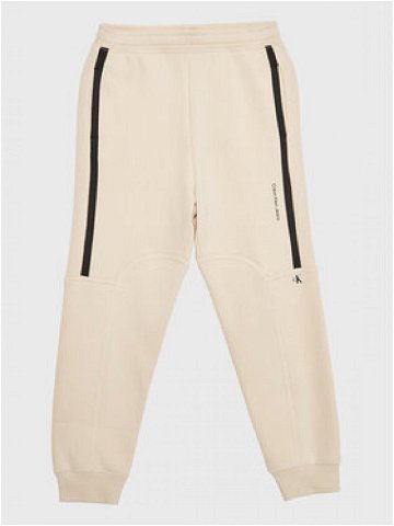 Calvin Klein Jeans Teplákové kalhoty Seaming Skater IB0IB01506 Béžová Regular Fit